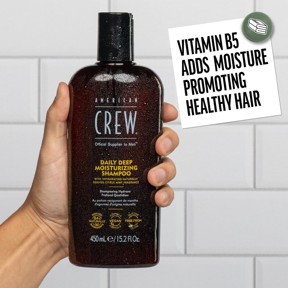Lifestyle scene with AMERICAN CREW Deep Moisturizing Shampoo in bathroom