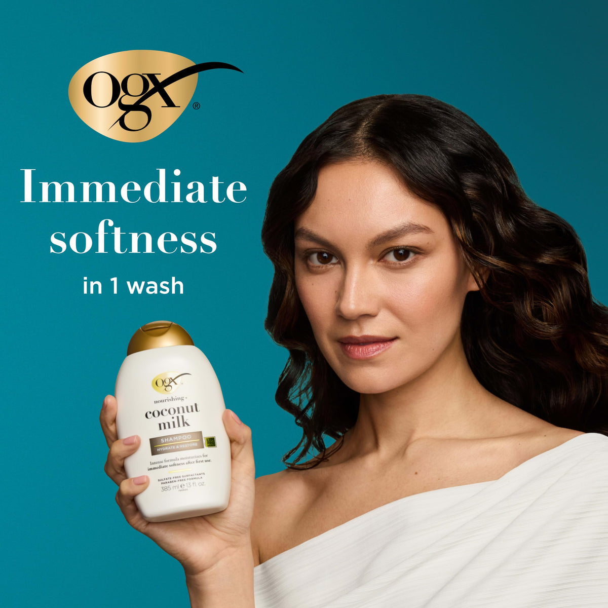 Lifestyle scene with OGX Coconut Milk Shampoo and Conditioner in a bathroom