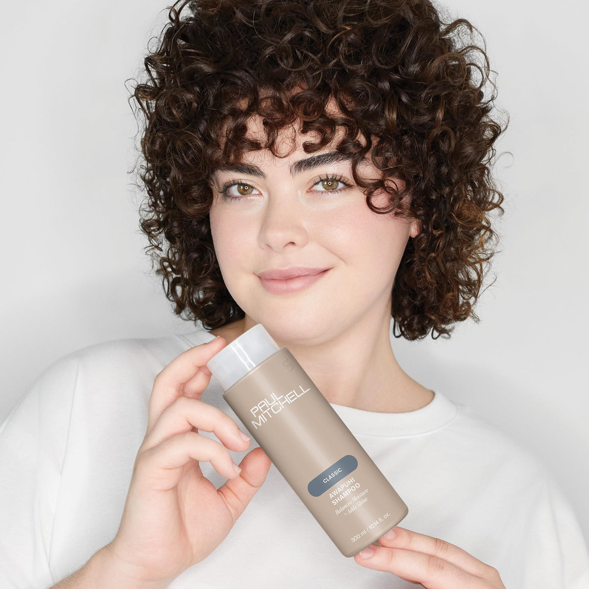 Lifestyle scene with Paul Mitchell Awapuhi Shampoo