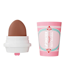 Lifestyle shot of Lip Smacker balms on a festive table