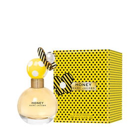 Lifestyle shot of Marc Jacobs Honey Eau de Parfum on a vanity table