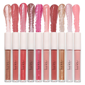 Lifestyle shot of Nicole Miller lip gloss in use
