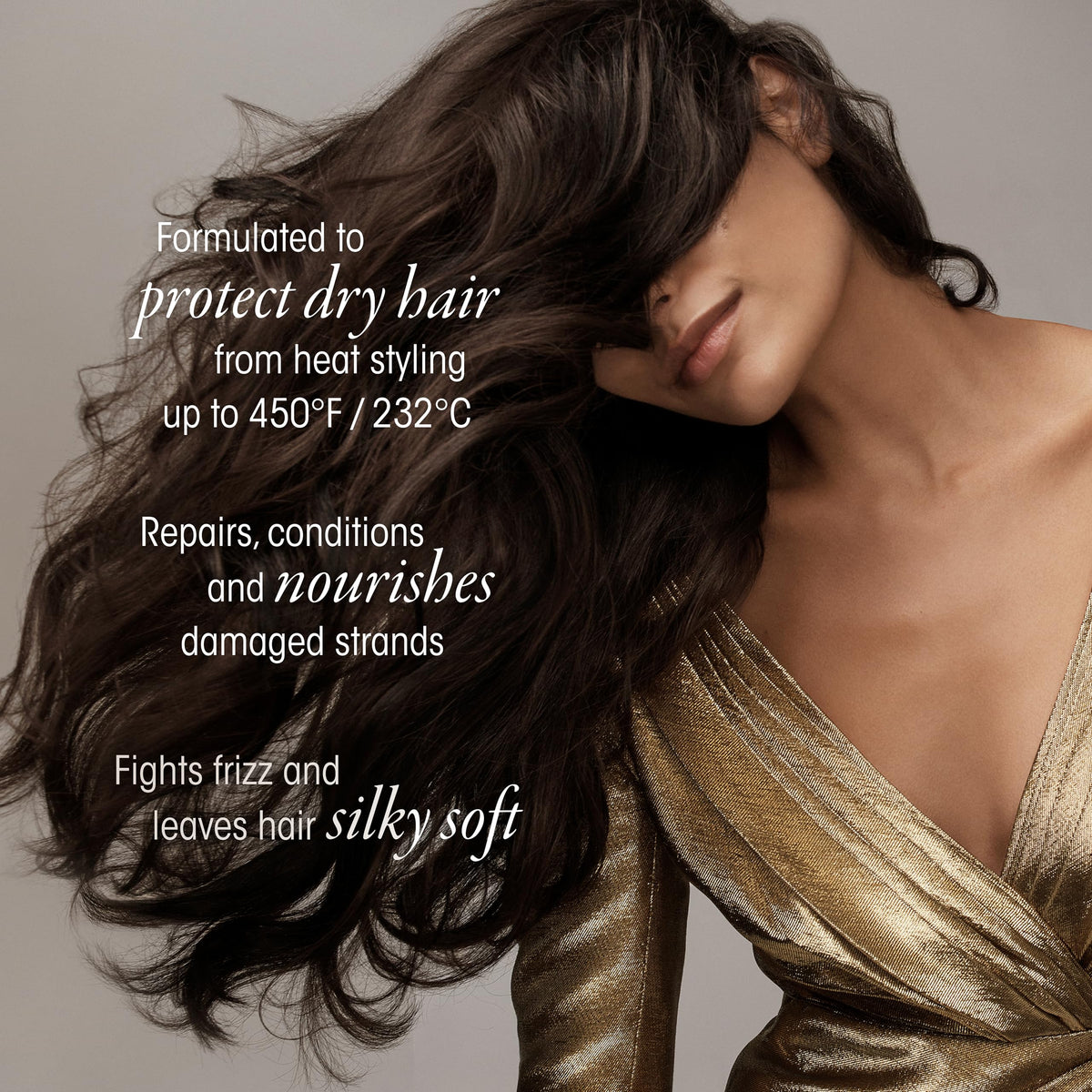 Lifestyle shot of ORIBE Gold Lust Dry Heat Protection Spray on vanity