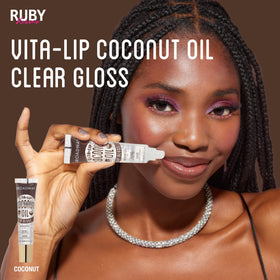 Lifestyle shot of Ruby Kisses Vita-Lip Clear Lip Gloss being applied