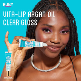 Lifestyle shot of Ruby Kisses Vita-Lip Gloss in use