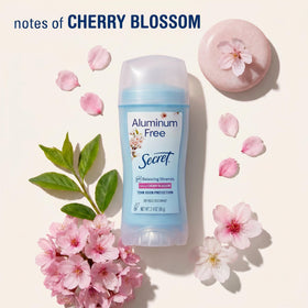 Lifestyle shot of Secret Aluminum Free Deodorant Cherry Blossom in use