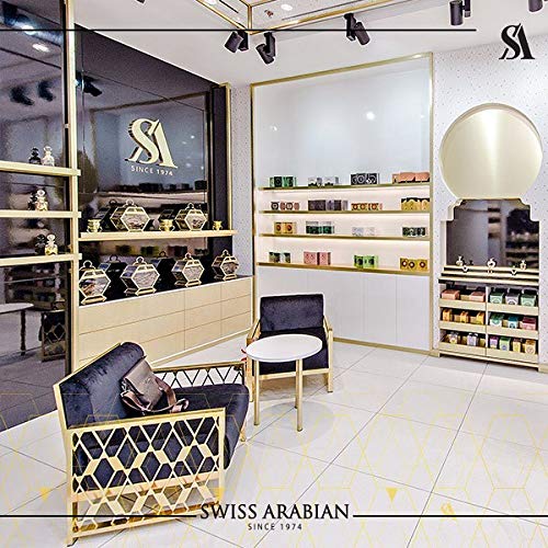 Lifestyle shot of Swiss Arabian Yulali parfum oil on a vanity