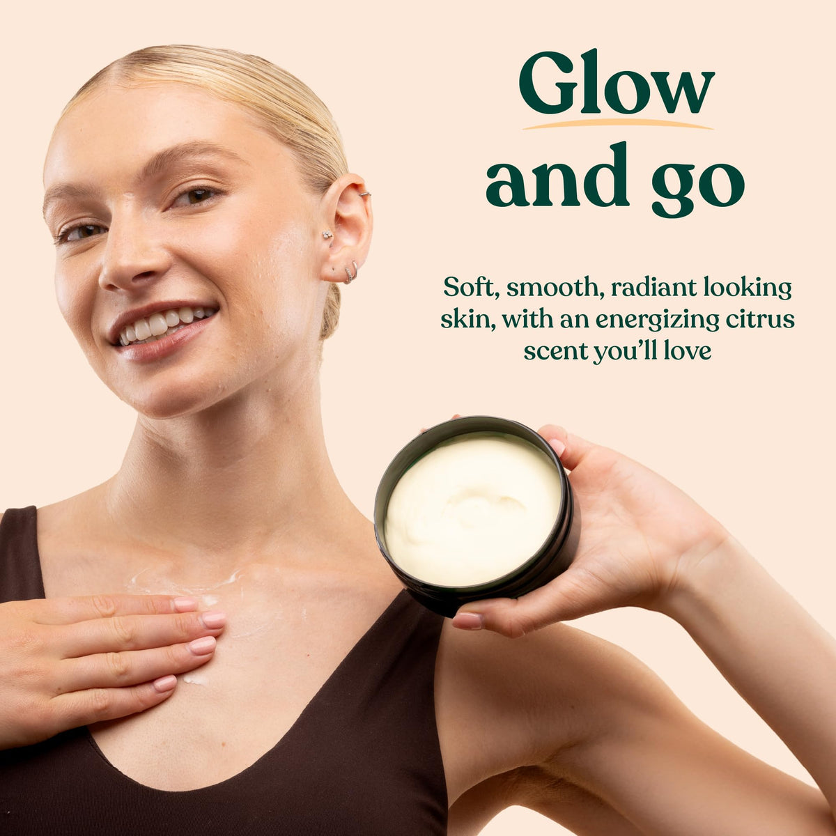Lifestyle shot of The Body Shop Satsuma Body Butter on a bathroom shelf