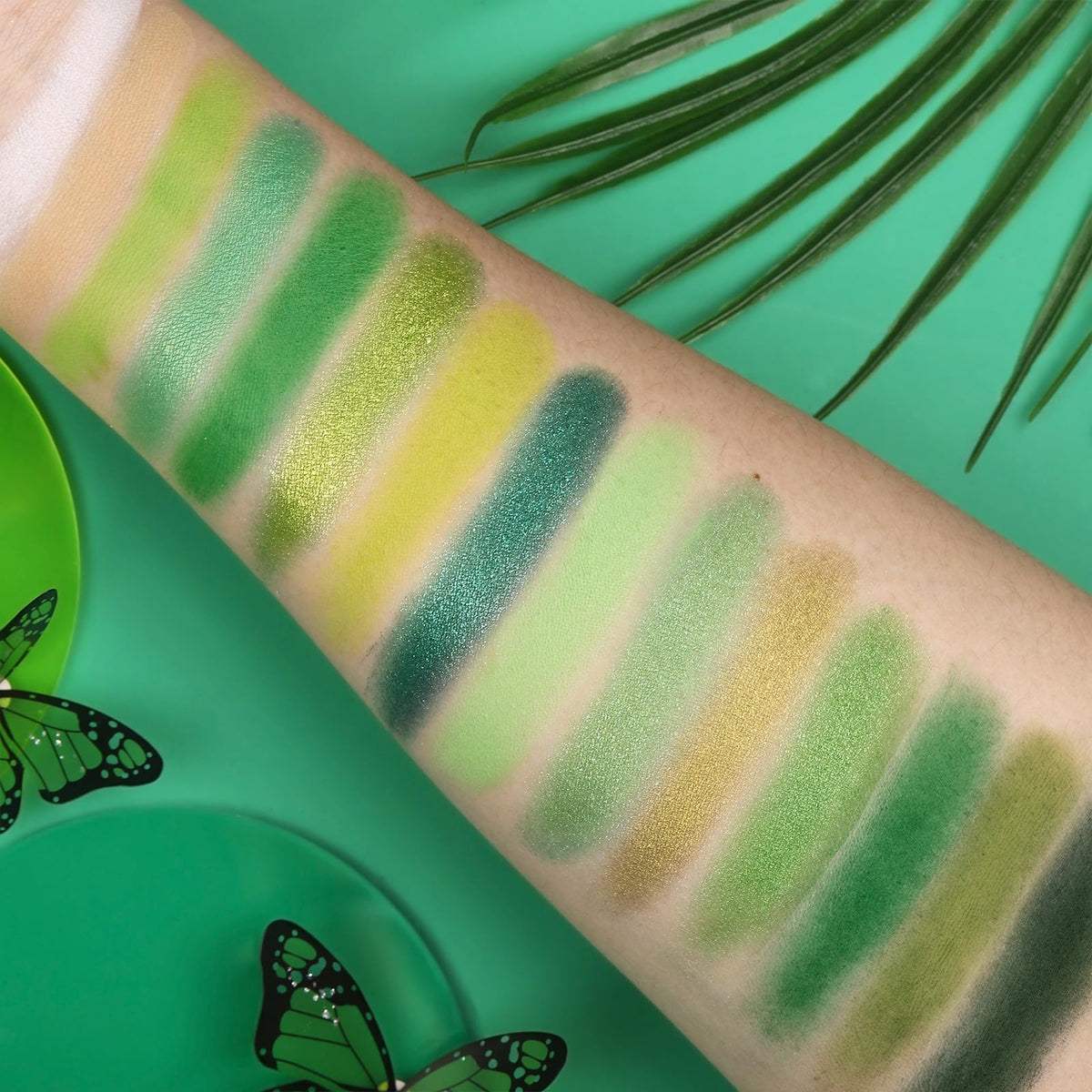 Lifestyle shot of UCANBE Green Eyeshadow Palette in use on model