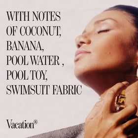 Lifestyle shot of VACATION Eau de Toilette on a beach