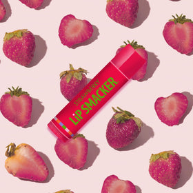 Lip Smacker Flavored Lip Balm Trio with a hand holding it