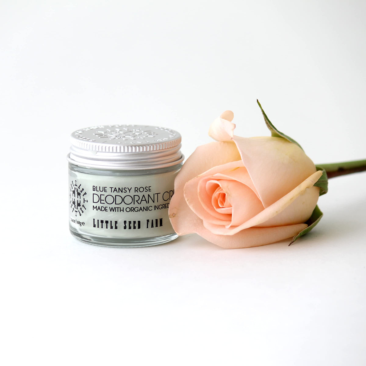 Little Seed Farm deodorant cream in natural setting