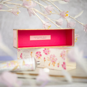 LOLLIA Breathe Hand Cream 4 oz side view showing ingredients