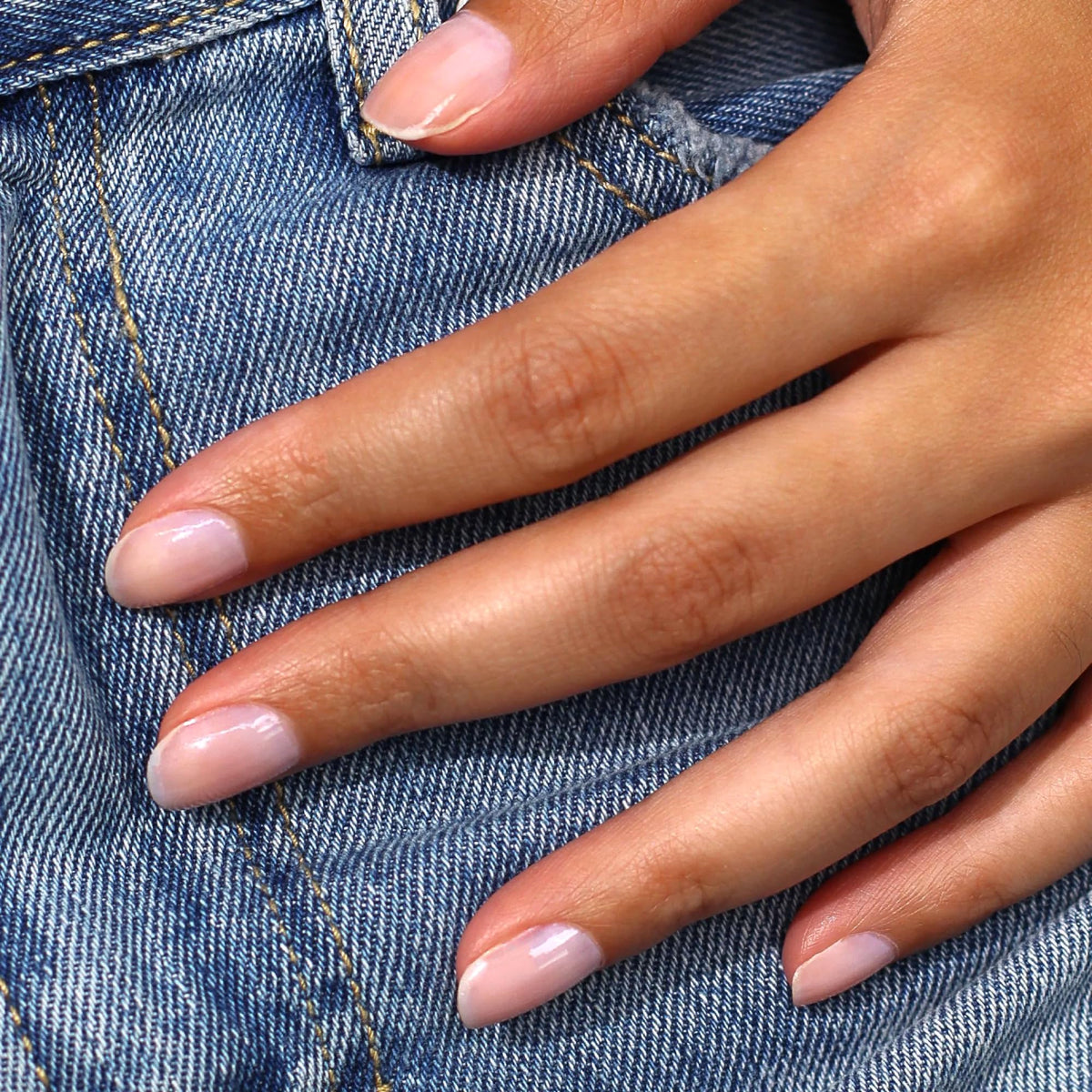LONDONTOWN kur Illuminating Nail Concealer in lifestyle setting