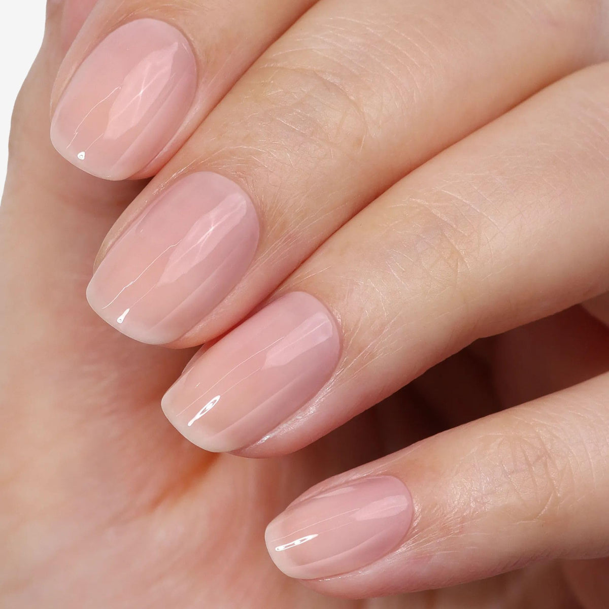 LONDONTOWN kur Perfecting Nail Veil Dusty Rose Tint in lifestyle setting