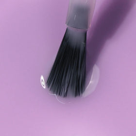 LONDONTOWN Perfecting Nail Veil #9 Sheer Lilac Tint on a vanity