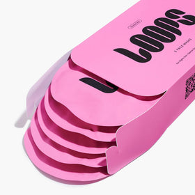 LOOPS Double Take Glow Hydrogel Face Mask on a bathroom counter