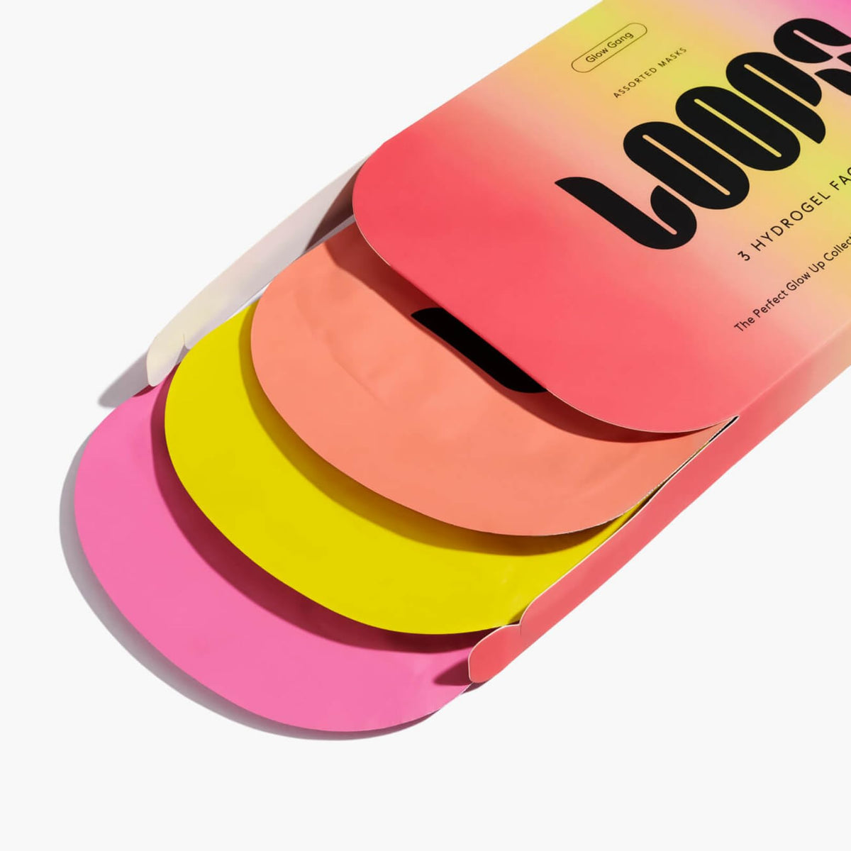 LOOPS Glow Gang Face Masks laid out on a flat surface