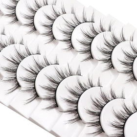 Losha Manga Lashes displayed with makeup accessories