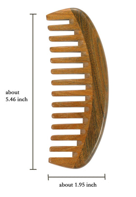 Louise Maelys wooden combs in a hand
