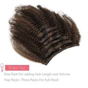 Loxxy Afro Kinky Curly Clip Ins with clips displayed on a flat surface