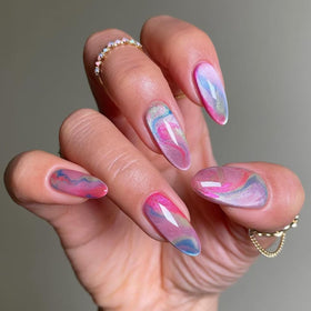 LPOODDNU 24Pcs Almond Press On Nails with Cat Eye Design front view