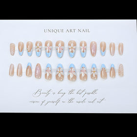 LPOODDNU Almond Flower Pearl Press On Nails in packaging