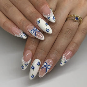 LPOODDNU Blue White Press On Nails Almond front view with packaging