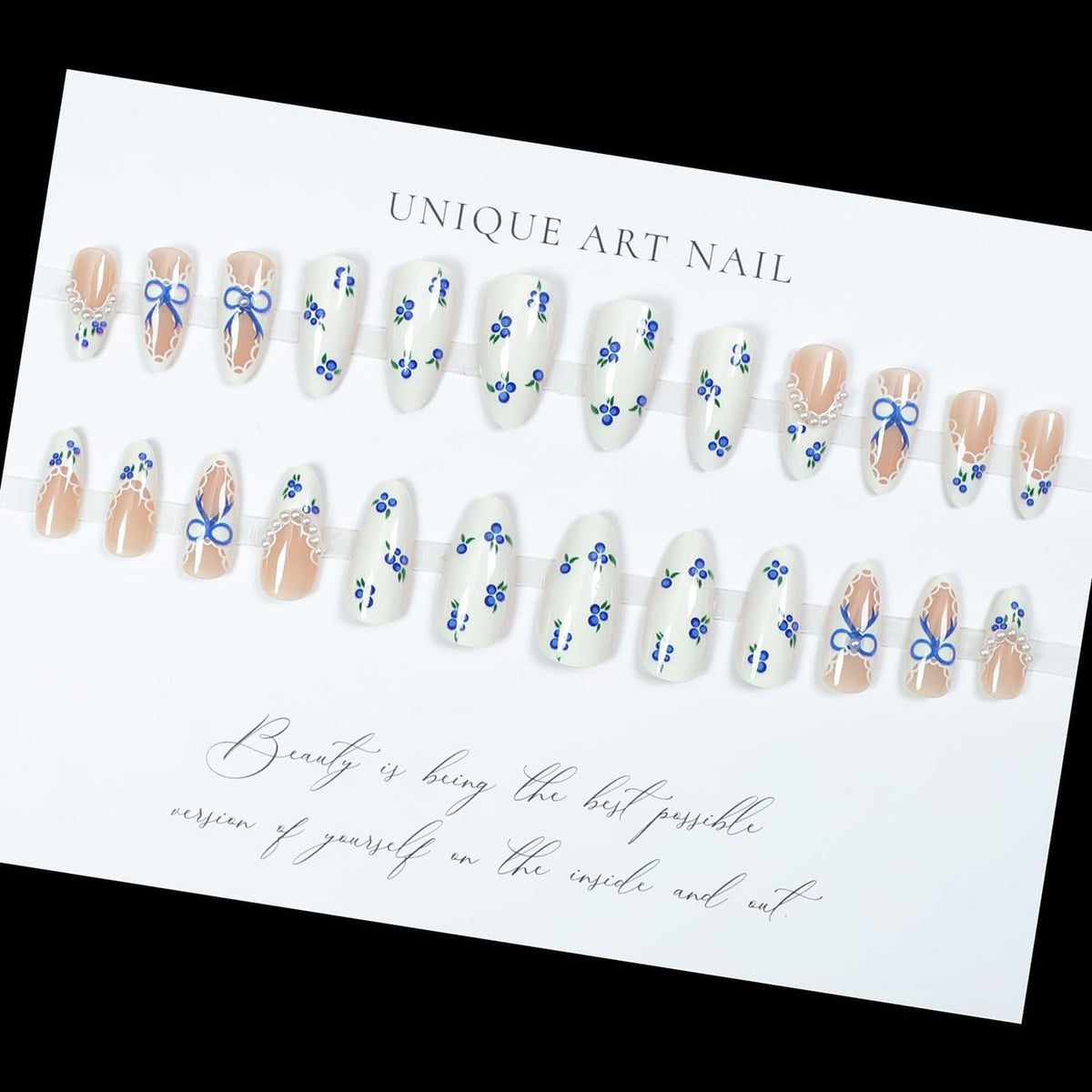 LPOODDNU Blue White Press On Nails Almond glossy finish close-up