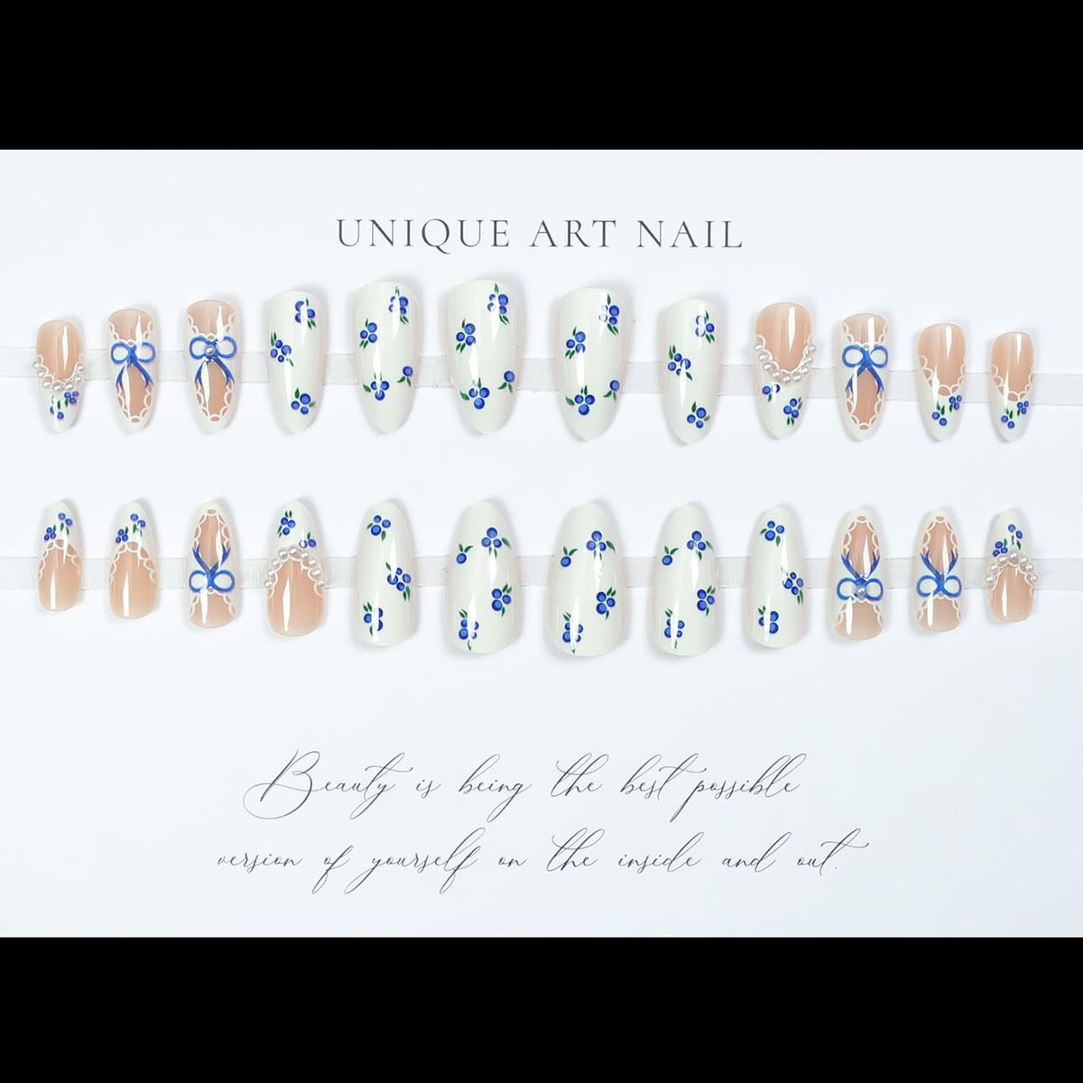 LPOODDNU Blue White Press On Nails Almond in use on hands