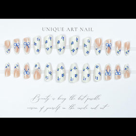 LPOODDNU Blue White Press On Nails Almond in use on hands
