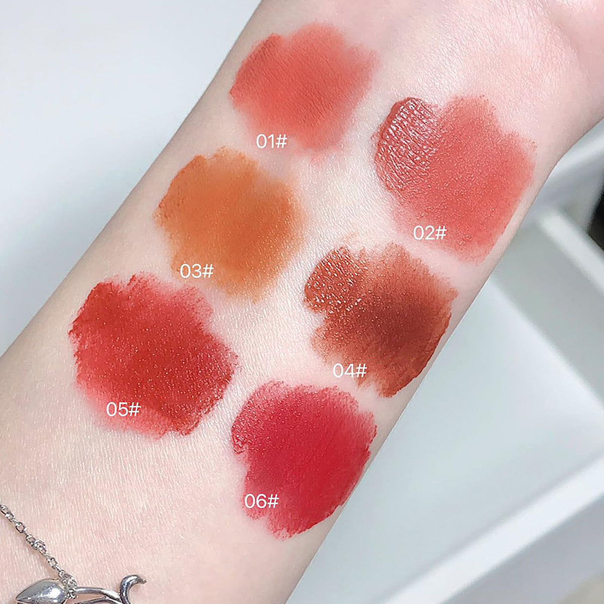 LuckNest Velvet Matte Lipstick swatches on skin