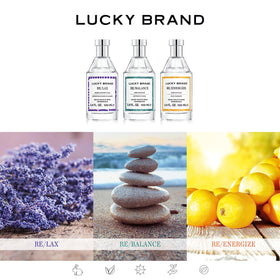 Lucky Brand Re/Energize fragrance on a wooden table