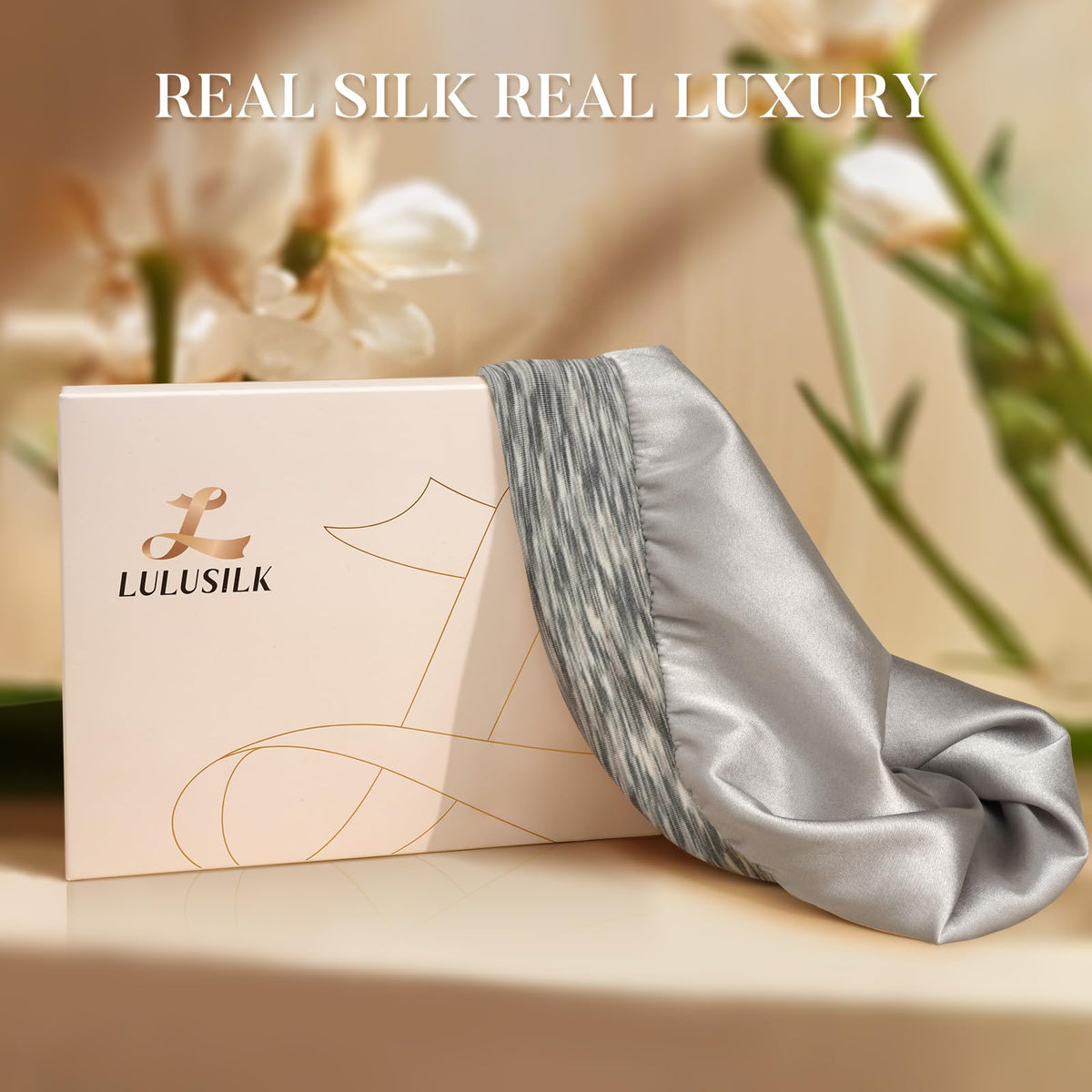 LULUSILK silk sleep cap on a bed setting