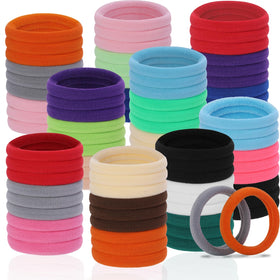 LuSeren hair ties with a background of hair styling products