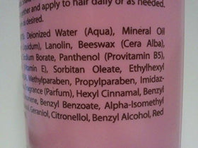 Luster's Pink Oil Moisturizer Hair Lotion 32 Ounce on a bathroom shelf