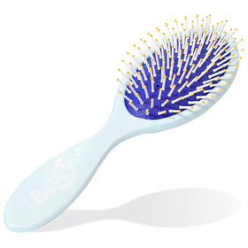 LUV HER Bluey hair brush held in a child's hand