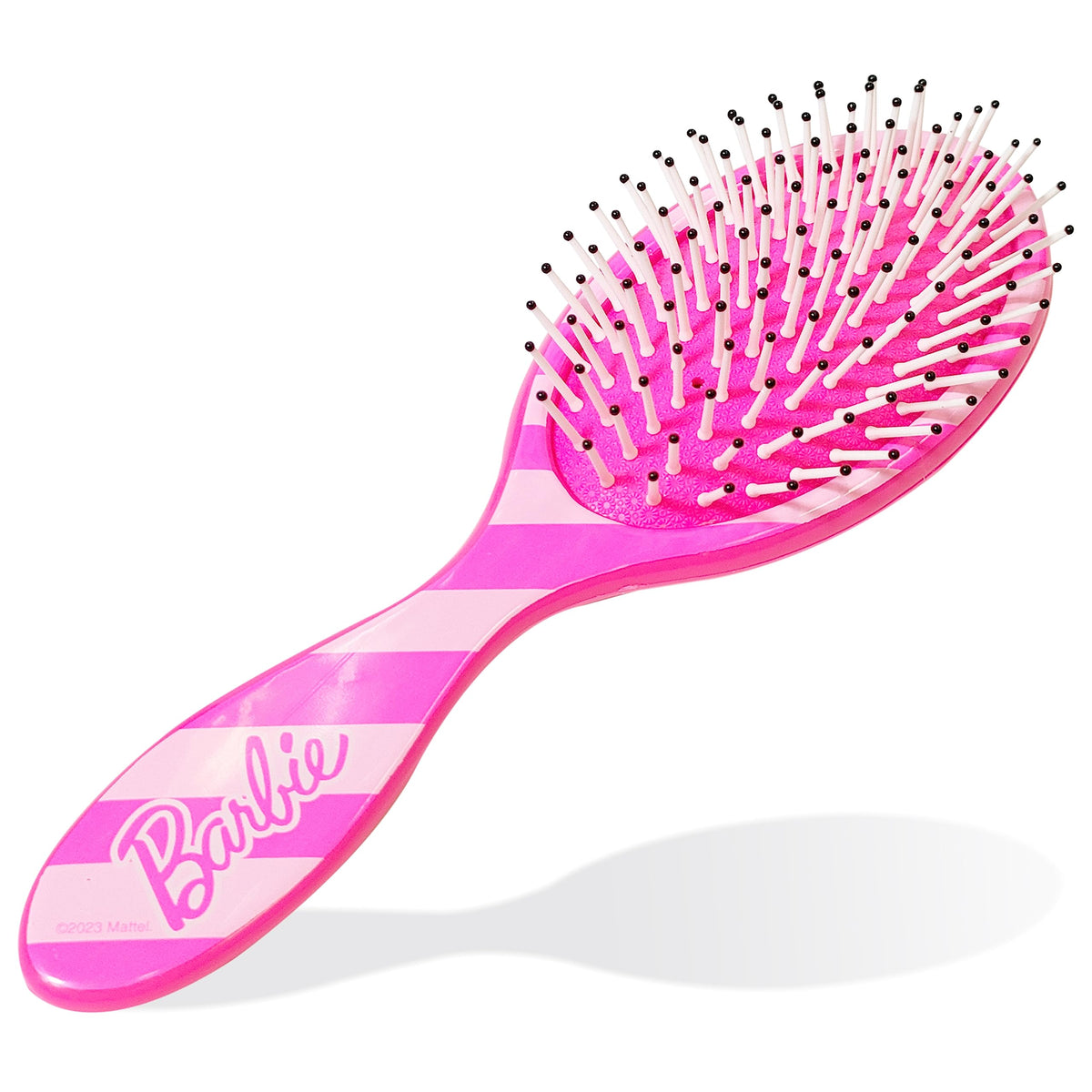 LUV HER hairbrush in use by a young girl