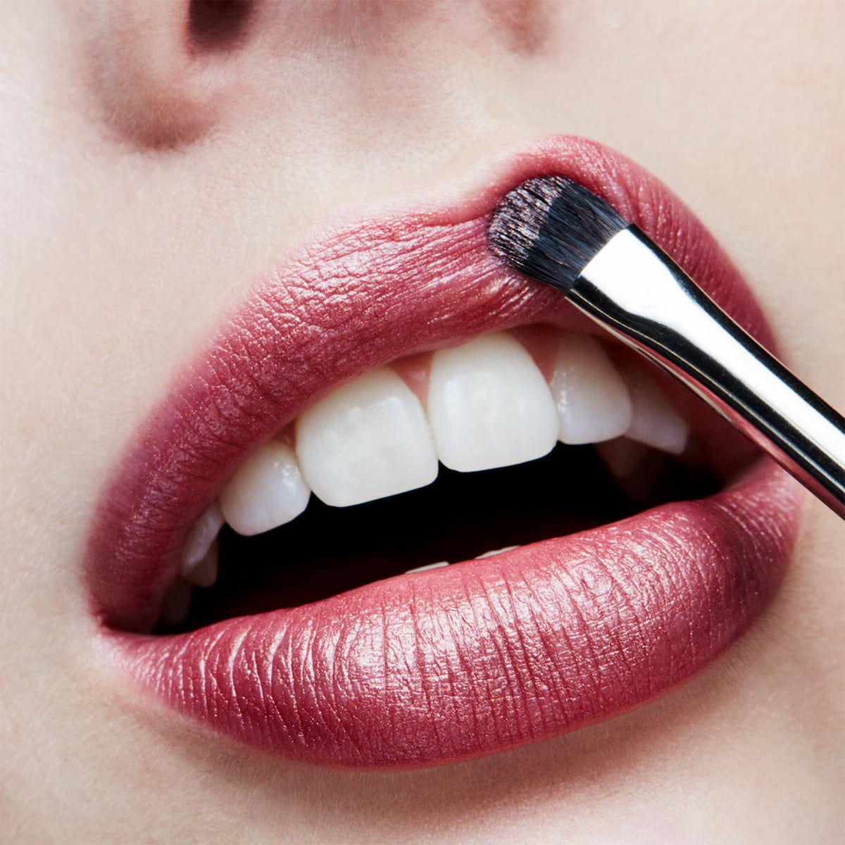MAC Lipstick Plum Dandy applied on lips