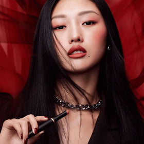 MAC Powder Kiss Velvet Blur Slim Stick in a beauty setting