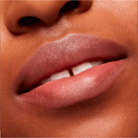 MAC Powder Kiss Velvet Blur Slim Stick in hand