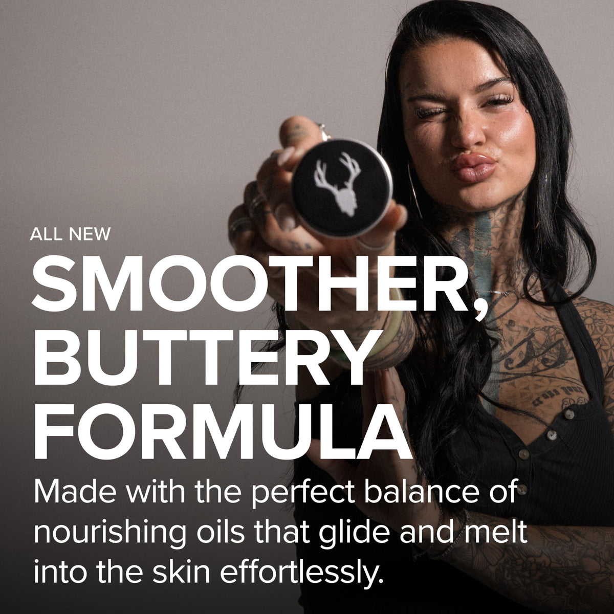 Mad Rabbit Tattoo Balm 0.7 oz displayed on a wooden surface