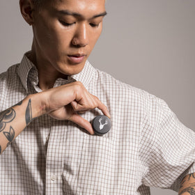Mad Rabbit Tattoo Balm being applied to a tattoo