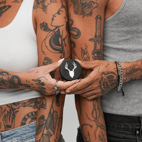 Mad Rabbit Tattoo Balm in a lifestyle setting