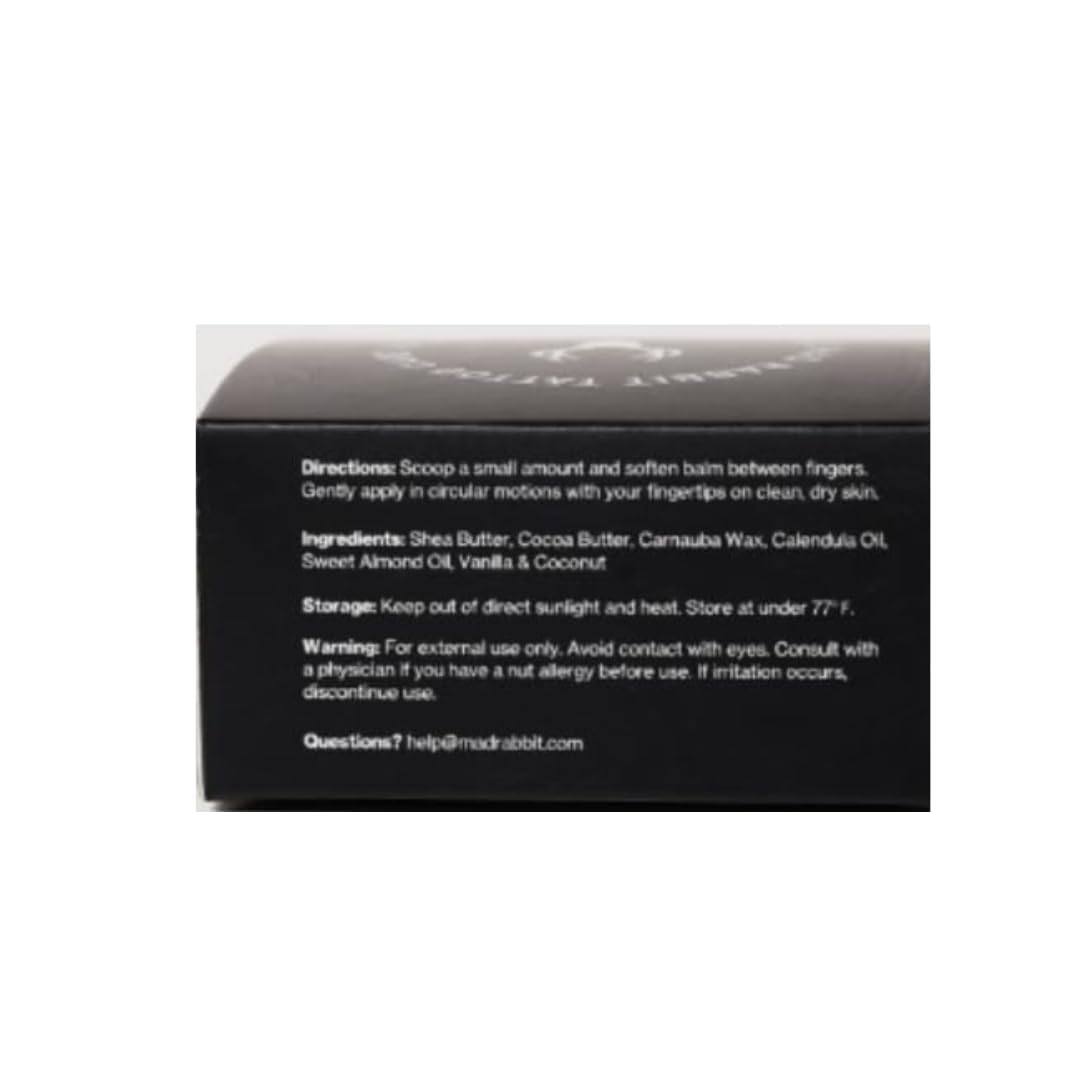Mad Rabbit Tattoo Balm with a tattoo artist's tools