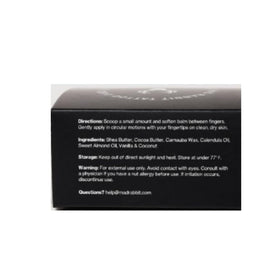 Mad Rabbit Tattoo Balm with a tattoo artist's tools