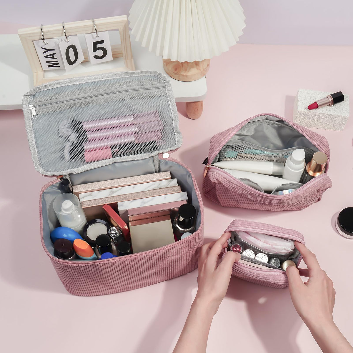 MAGEFY makeup bags arranged on a flat surface