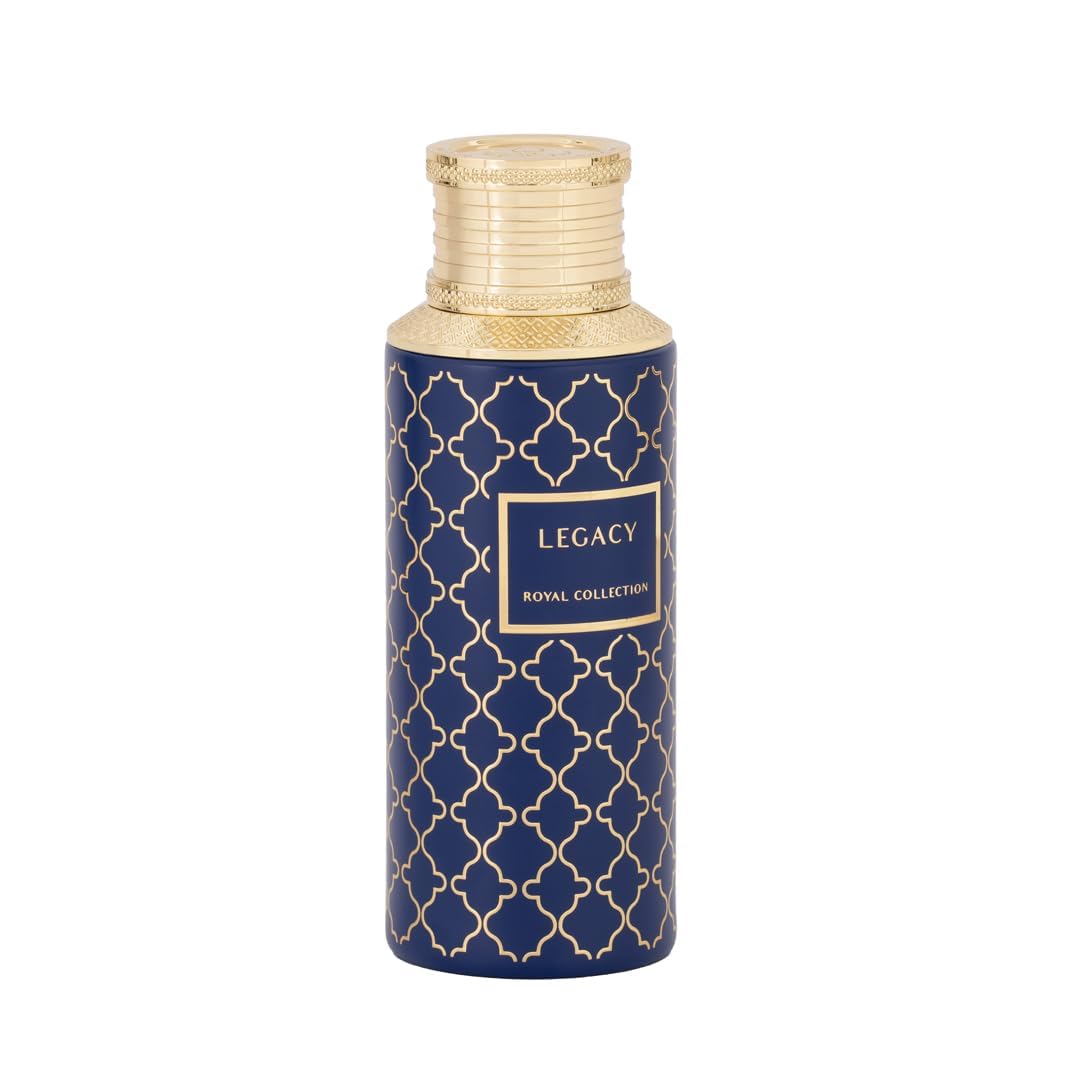 MAISON ASRAR EDP 100 ML on a vanity with flowers