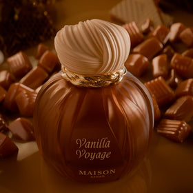 MAISON ASRAR Vanilla Voyage Eau de Parfum bottle with flowers
