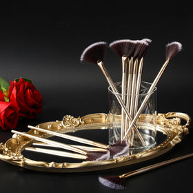 Maitys Facial Fan Brushes displayed on a vanity